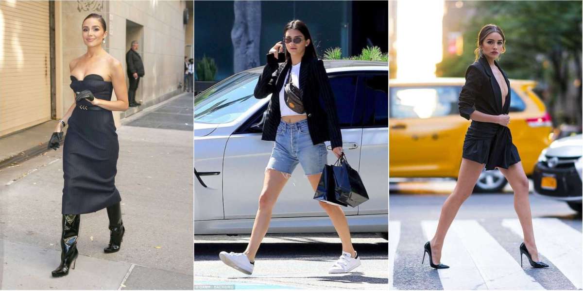 Hermes pants are nonchalantly whit white tank tops